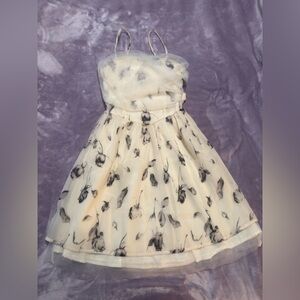 Elegant Floral spaghetti strap dress with mesh and ribbon